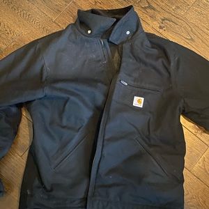 Thrifted carharrt jacket. great for winter, small graffiti on the back.